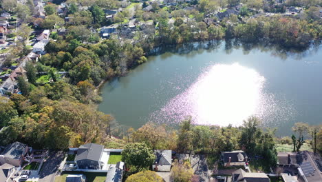 An-aerial-drone-view-of-Grant-Pond-in-a-Long-Island,-NY-suburb