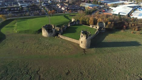 Historical-Flint-castle-medieval-military-ruins-landmark-aerial-view-high-angle-right-orbit
