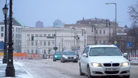 Cars-Driving-on-Frozen-and-Snowy-Streets-of-Berlin-on-Cold-Winter-Day