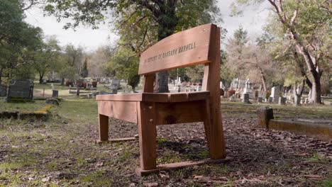 Empty-"In-Memory-Of"-Wooden-Bench-in-the-Jacksonville-Cemetery-in-Oregon---4K