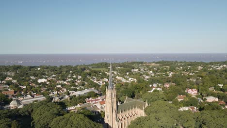 Aerial-of-San-Isidro-city-revealing-the-Cathedral-with-La-Plata-river-behind