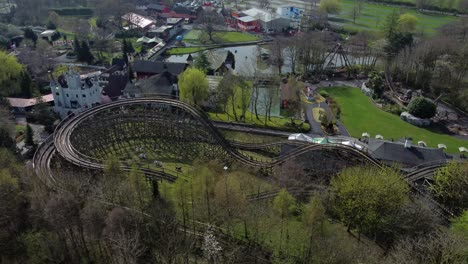 Gulliver's-world-Warrington-empty-rollercoaster-theme-park-aerial-view-above-amusement-rides-tracks-left-orbit