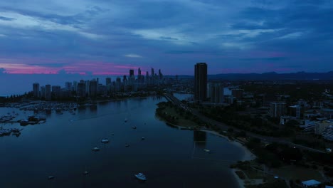Amazing-colors-of-sunrise,-drone-over-Gold-Coast-Broadwater,-Australia