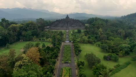 Empty-iconic-Buddhist-temple-Borobudur-Java-Indonesia-aerial-dolly-on-cloudy-day