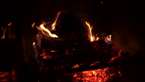 Sparks-Fly-off-of-Red-Hot-Glowing-Fire-in-Slow-Motion