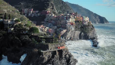 Aerial-view-of-Manarola,-5-Terre,-during-a-sea-storm