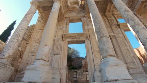 Upward-tiling-shot-of-tall-Corinthian-columns-at-the-Library-of-Celsus-in-the-ancient-city-of-Ephesus