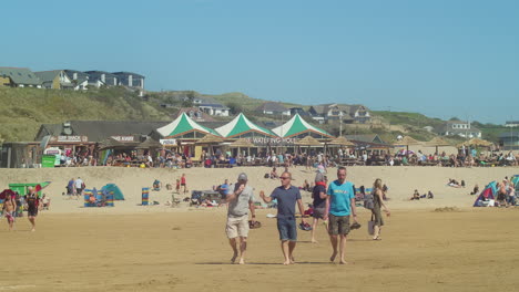 Crowd-Of-People-On-Golden-Sand-Beach