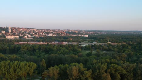 Aerial-shot-circling-around-the-city-of-Belgrade,-Serbia-from-a-distance
