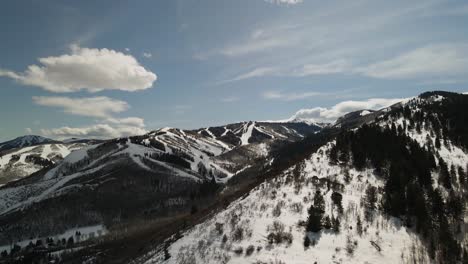 Drone-Over-Snowy-Ski-Mountain-in-Park-City,-Utah