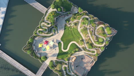 a-top-down-shot-directly-above-a-park-known-as-Little-Island-in-NYC-on-a-sunny-morning
