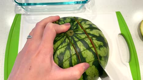Hand-cutting-a-watermelon.-Time-lapse-video