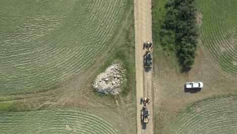 Top-Down-Aerial,-Two-Road-Graders-Build-New-Farmland-Road-in-Rural-Countryside-Saskatchewan,-Canada