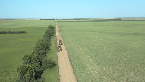 Aerial-View-Of-Road-Graders-At-The-Rough-Road-In-Canadian-Province-Of-Saskatchewan