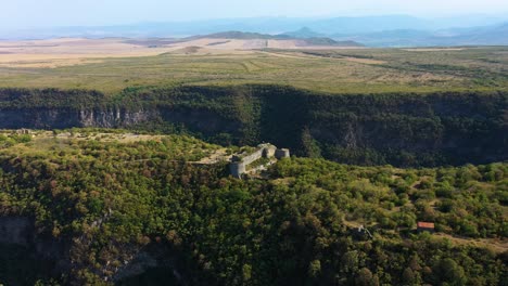 Aerial-View-Of-Samshvilde-Citadel-Ruins-On-Steep-Edge-Of-Promontory-In-Kvemo-Kartli,-Georgia