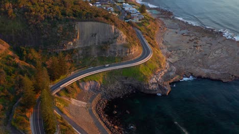 Sea-Cliff-Bridge-Along-The-Grand-Pacific-Drive-In-New-South-Wales,-Australia---aerial-drone-shot