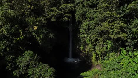 Hidden-Tuasan-waterfall-in-paradise-jungle-of-Camiguin-island,-aerial
