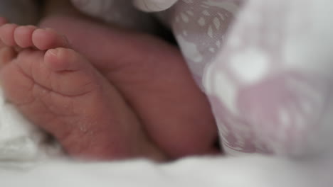 Close-up-of-baby-feet-moving