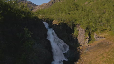 Turelva-Rapids-Rushing-From-Steep-Rocky-Mountains-In-Finnmark,-Norway