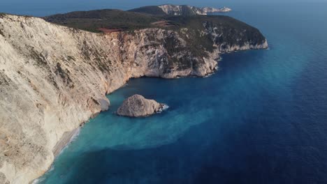 Aerial-cinematic-view-of-the-iconic-rock-formation-of-the-Porto-Katsiki-beach-in-Lefkada,-Greece