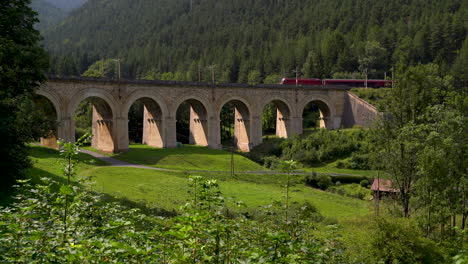 Beautiful-viaduct-at-Semmering-Railway-in-Austria-with-train-passing-through