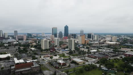 Aerial-view-around-the-downtown-of-Jacksonville,-Florida,-USA---wide,-orbit,-drone-shot
