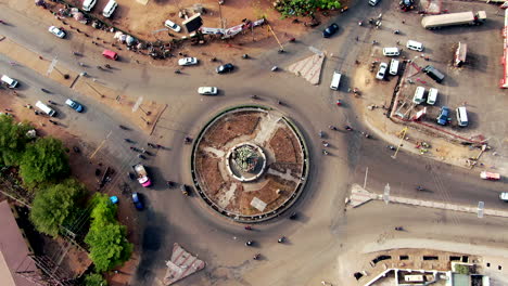 A-traffic-roundabout-in-Makurdi-Town,-Nigeria-featuring-a-giant-monument-in-its-center-to-show-Benue-State-as-the-Nations's-food-basket