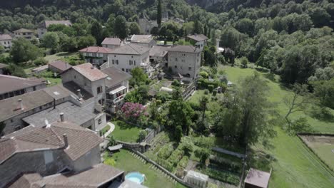 video-cenital-and-bird's-eye-view-plane-with-drone-flying-cognin-les-gorges-above-the-town-and-houses