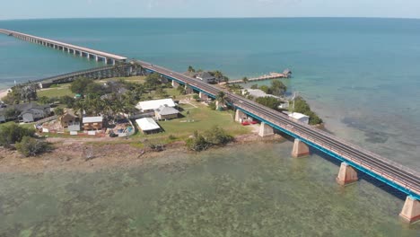 seven-mile-bridge-florida-keys-pigeon-old-new-tropical-vacation-destination-blue-water-gulf-of-mexico-tourism-aerial-drone