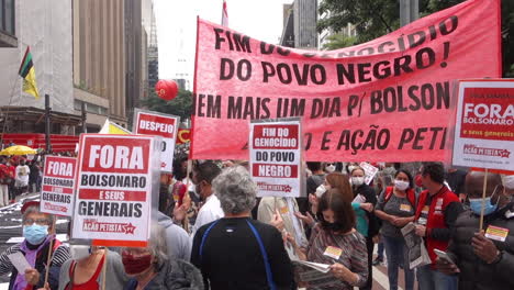Flags,-Banners-and-People-Crowd-on-Black-Consciousness,-Protest-Against-Racism,-Covid-Measures-and-President-Bolsonaro,-Close-Up,-Slow-Motion