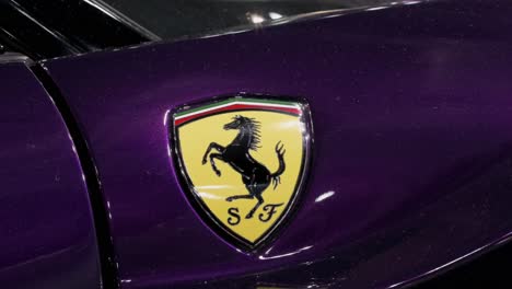 Italian-luxury-sport-car-manufacturer,-Ferrari-logo-seen-on-a-GT-Ferrari-458-luxury-supercar-during-the-International-Motor-Expo-in-Hong-Kong