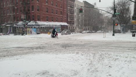 Bicycle-Nearly-Gets-Hit-By-Car-During-Heavy-Snow-In-New-York-City-Street