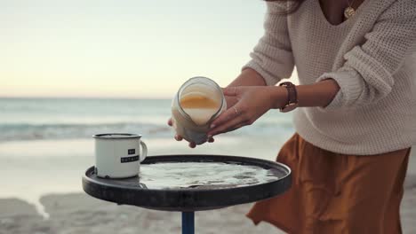 Slow-motion-footage-of-a-Woman-Baking-Pancakes-in-a-Sheet-Pan-in-broad-daylight-at-the-beach