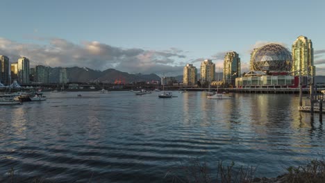 Timelapse-of-Vancouver-sunset-skyline-Canada-Science-World-centre-British-Columbia,-panoramic-of-modern-building-cityscape-and-ferry-boat