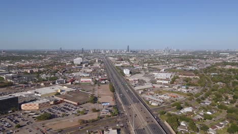 Aerial-view-of-the-PlazAmericas-shopping-center-and-the-I-69-southwest-freeway,-in-sunny-Houston,-USA