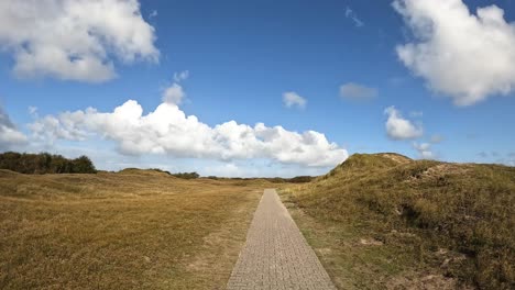 Walking-along-a-hiking-path-in-the-nature-reserve-Norderney-Germany