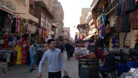 Street-view,-Crowded-colorful-bazaar,-people-walking-on-busy-street,-Touristic-Cairo