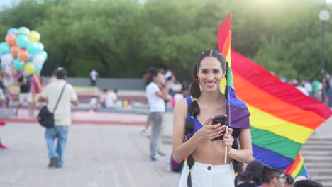 A-girl-holding-rainbow-flag-participated-in-LGBT-Pride-Parade-in-Monterrey