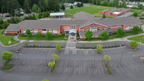 Aerial-of-a-vacant-elementary-school-during-the-summer