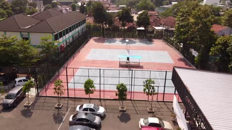 Aerial-view-of-badminton-courts-with-surrounded-green-trees