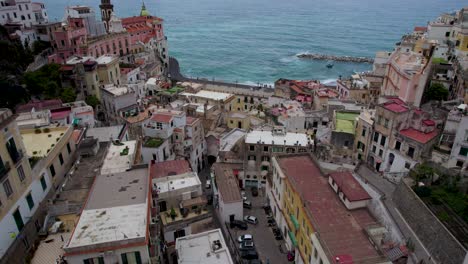 Tilt-up-Reveal-Aerial-of-Town-Buildings-on-Amalfi-Coast,-Italy