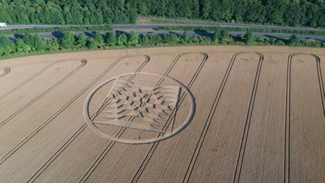 Agricultural-Field-With-Crop-Circle-And-Tractor-Tracks-In-Micheldever-Station,-England
