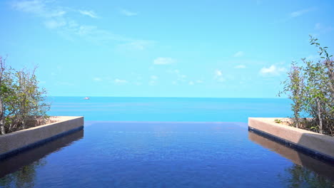 High-rise-rooftop-infinity-pool-with-amazing-view-on-turquoise-seascape
