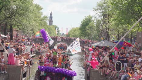 LGBTQ-activists-singing-and-dancing-during-a-grand-Pride-Parade-in-Amsterdam,-North-Holland,-Netherlands