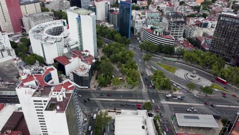 Tilt-Shot-Revealing-the-Intersection-Of-Reforma-and-Insurgentes-Avenues-in-Downtown-Mexico-City-with-Traffic-on-the-Weekend