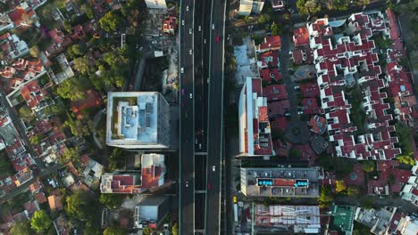 Commuter-Cars-Driving-on-Interstate-Highway-Road,-Segundo-Piso-Periférico-in-Mexico-City---Aerial-Top-Down-Overhead-View
