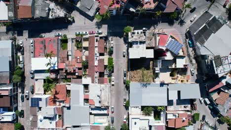 symmetrical-top-down-of-Puerto-Vallarta-homes-and-neighborhoods,-aerial