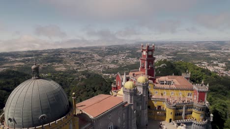 Drone-hovering-above-capturing-the-exterior-details-of-Pena-palace-in-Sintra-Portugal