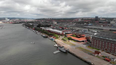 Aerial-birds-eye-view-overlooking-at-the-city-habour-in-Gothenburg-Sweden-on-a-cloudy-day