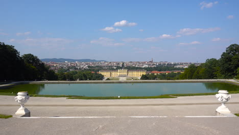 Wide-open-panoramic-view-on-clear-blue-sky-day-with-few-clouds-at-Schönbrunn